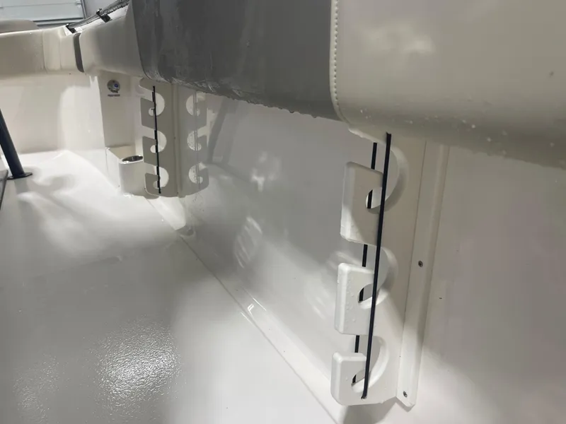 Slide: The Image of 2024 Key West 291FS boat interior detail with rod holders. - 44