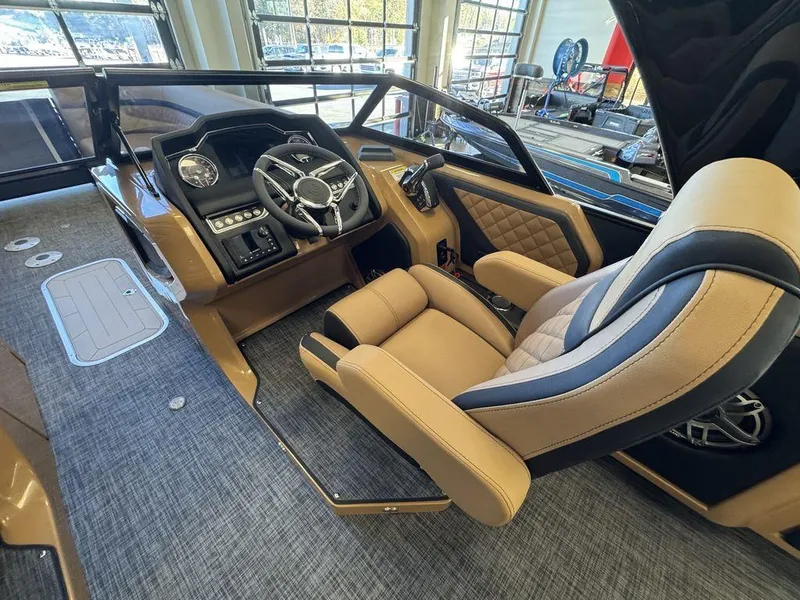 Slide: The Image of Luxurious interior of 2025 Godfrey AquaPatio 255 DFLW pontoon boat with plush seating. - 22