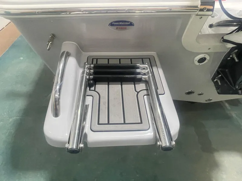 Slide: The Image of 2025 Tidewater 198CC boat swim platform with retractable ladder. - 15
