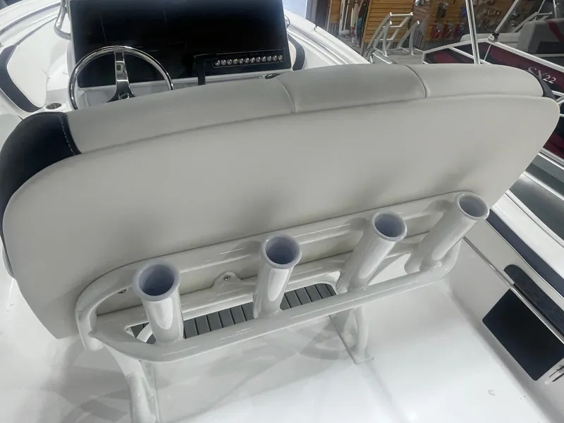 Slide: The Image of 2025 Tidewater 198CC boat seat with integrated rod holders. - 20