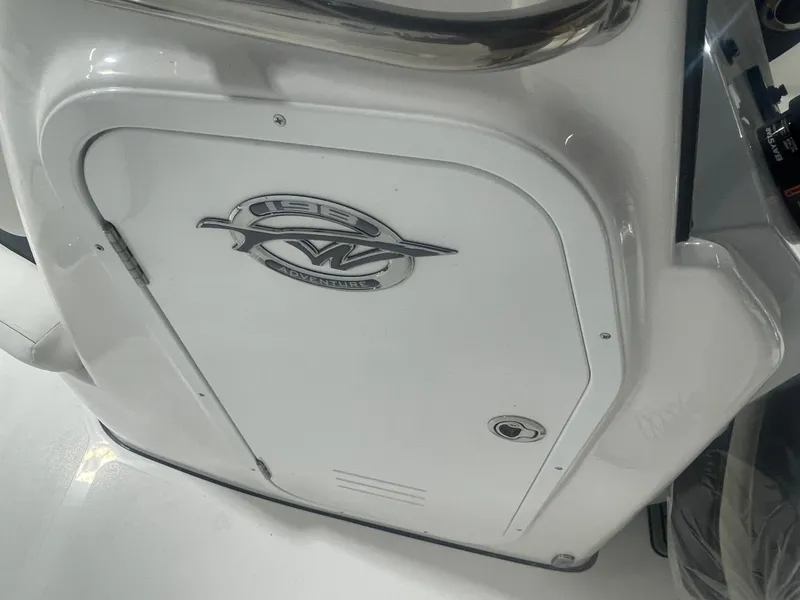 Slide: The Image of 2025 Tidewater 198CC boat console with Adventure logo, white finish. - 36
