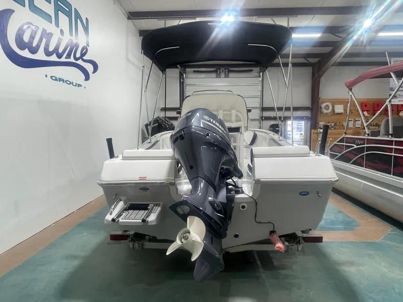 Slide: The Image of 2025 Tidewater 198CC boat with Yamaha outboard motor in showroom. - 5