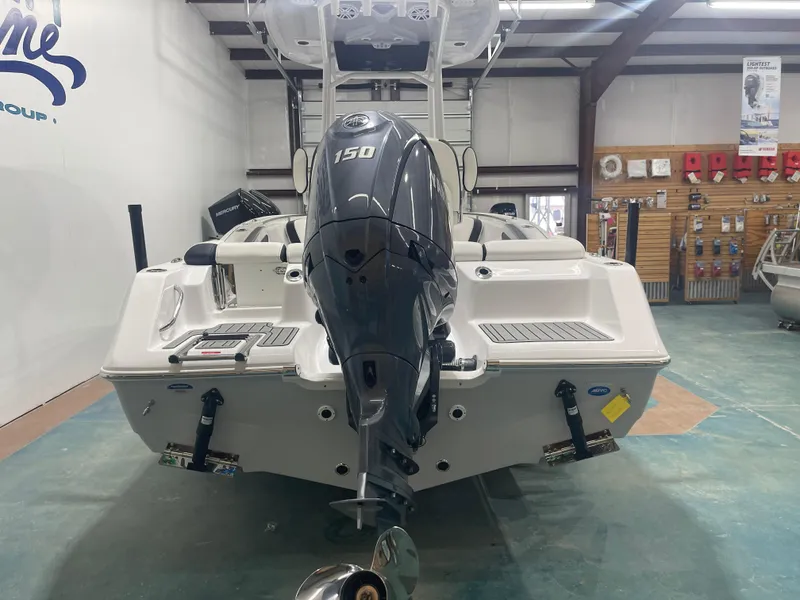 Slide: The Image of 2025 Tidewater 210LXF boat with 150 HP engine in showroom. - 8
