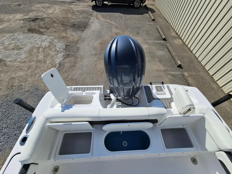 Slide: The Image of 2025 Tidewater 220LXF boat with outboard motor, viewed from above. - 10