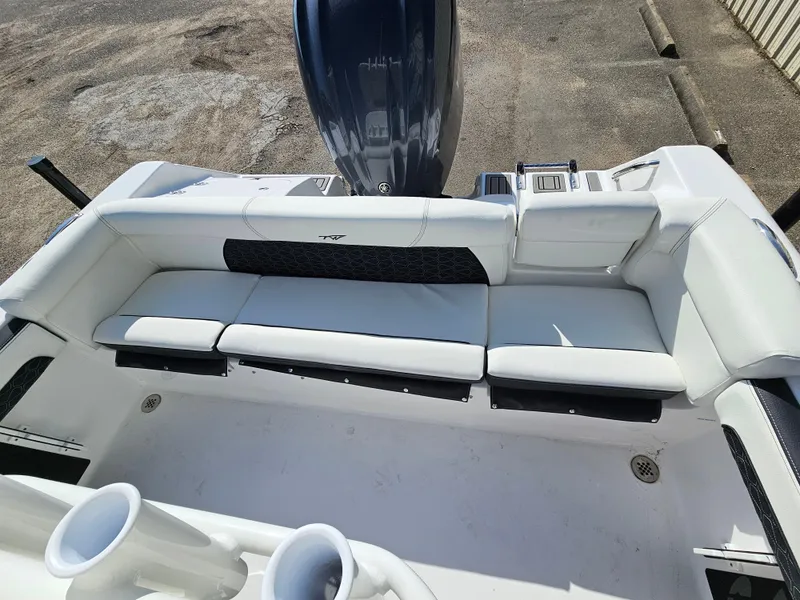 Slide: The Image of 2025 Tidewater 220LXF boat with white seating and sleek design. - 27