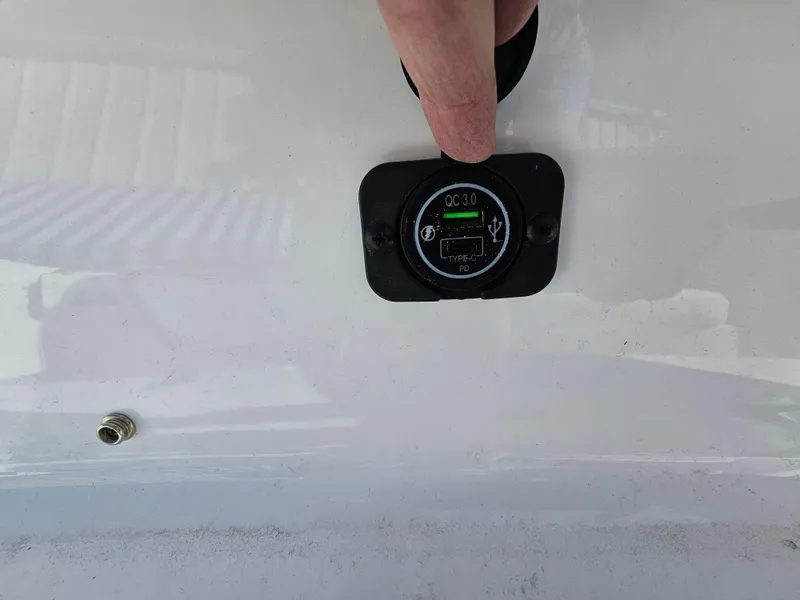 Slide: The Image of Close-up of a USB Type-C QC 3.0 port on a 2025 Tidewater 220LXF boat. - 30