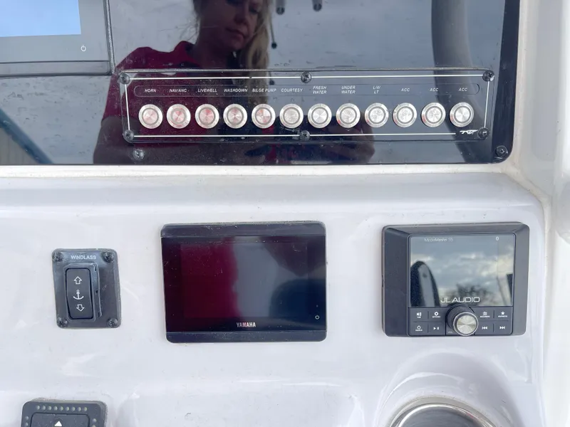 Slide: The Image of Control panel of 2025 Tidewater 232cc boat with Yamaha and JL Audio displays. - 22