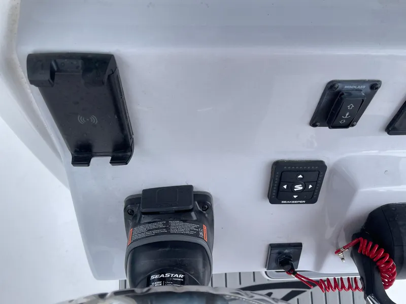 Slide: The Image of Control panel of 2025 Tidewater 232cc boat with Seastar and Seakeeper systems. - 23