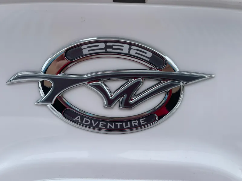 Slide: The Image of Tidewater 232cc Adventure 2025 emblem on white background. - 27