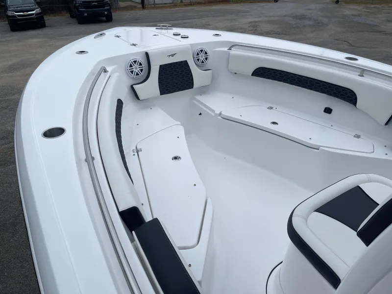 Slide: The Image of 2025 Tidewater 232cc boat interior with white seating and modern design. - 29