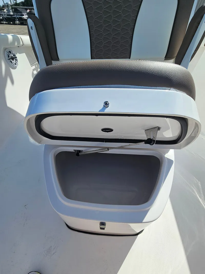 Slide: The Image of 2024 Tidewater 272cc boat seat with open storage compartment. - 33