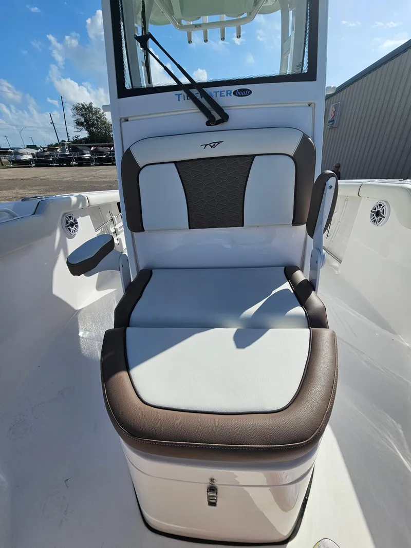 Slide: The Image of 2024 Tidewater 272cc boat seat with brown and white upholstery. - 34