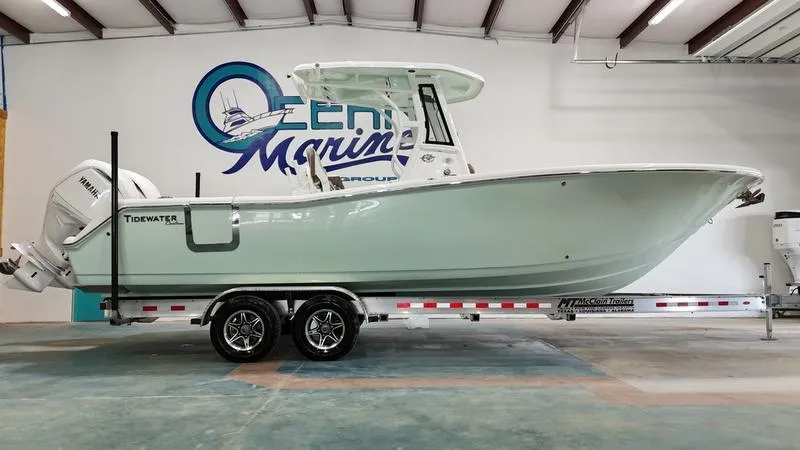 Slide: The Image of 2024 Tidewater 272cc boat on trailer in showroom. - 36