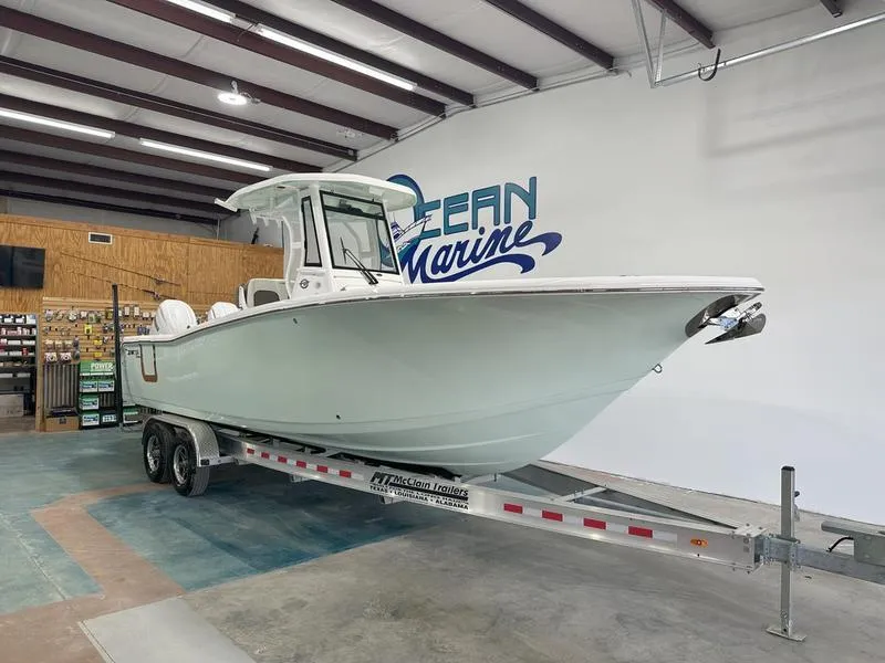 Slide: The Image of 2024 Tidewater 272cc boat on trailer in showroom. - 37
