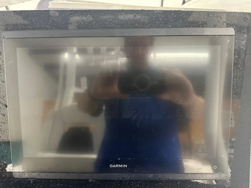 Slide: The Image of Garmin display on 2024 Tidewater 292CC boat, slightly foggy screen. - 38