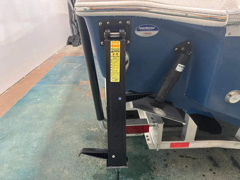 Slide: The Image of 2024 Tidewater 292CC boat transom with Yamaha PowerMatched system and trailer. - 5
