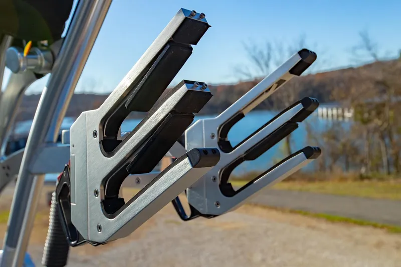 Slide: The Image of Close-up of 2019 MasterCraft X24 wakeboard racks by a lake. - 33