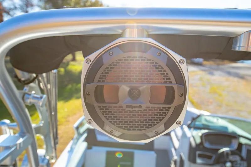 Slide: The Image of Close-up of a 2019 MasterCraft X24 boat speaker system in sunlight. - 39