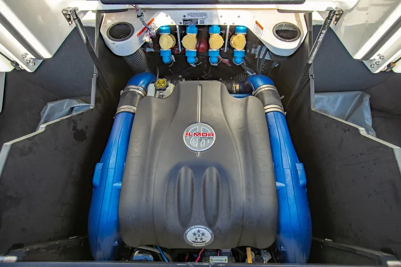 Slide: The Image of 2019 MasterCraft X24 engine compartment with Ilmor engine, blue accents. - 42