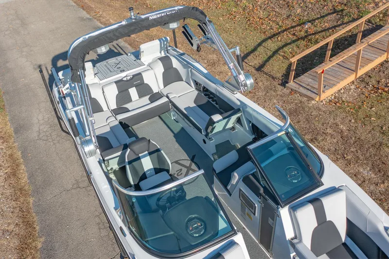 Slide: The Image of 2019 MasterCraft X24 boat with spacious seating and sleek design. - 8