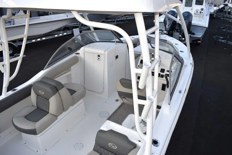 Slide: The Image of 2025 Key West 239 DFS boat interior with seating and console. - 10