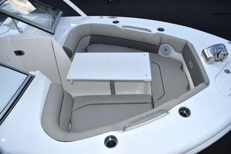 Slide: The Image of 2025 Key West 239 DFS boat interior with seating and table. - 16
