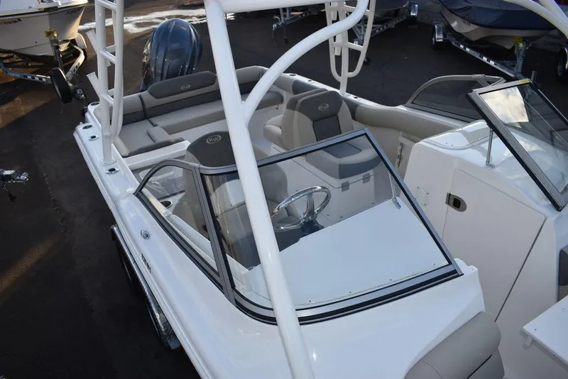 Slide: The Image of 2025 Key West 239 DFS boat with sleek design and spacious seating. - 18