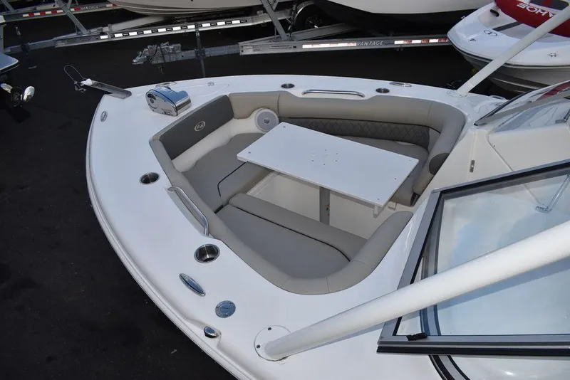 Slide: The Image of 2025 Key West 239 DFS boat with bow seating and table. - 21