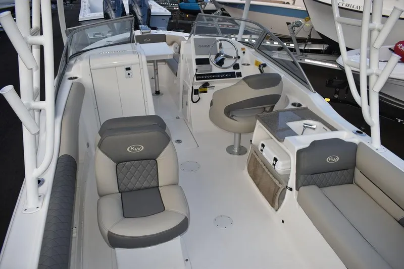 Slide: The Image of 2025 Key West 239 DFS boat interior with seating and helm. - 26