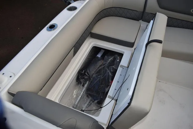 Slide: The Image of 2025 Key West 239 DFS boat storage compartment with cushioned seating. - 28