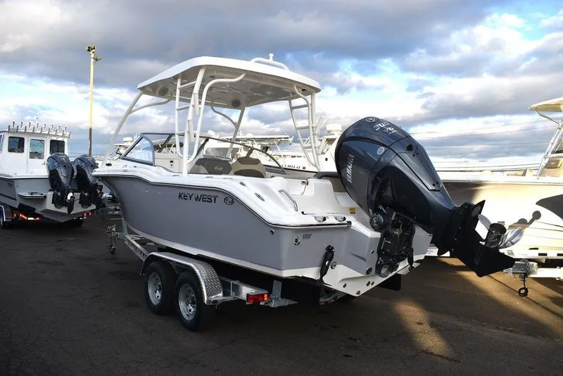 Slide: The Image of 2025 Key West 239 DFS boat with dual engines on a trailer. - 3