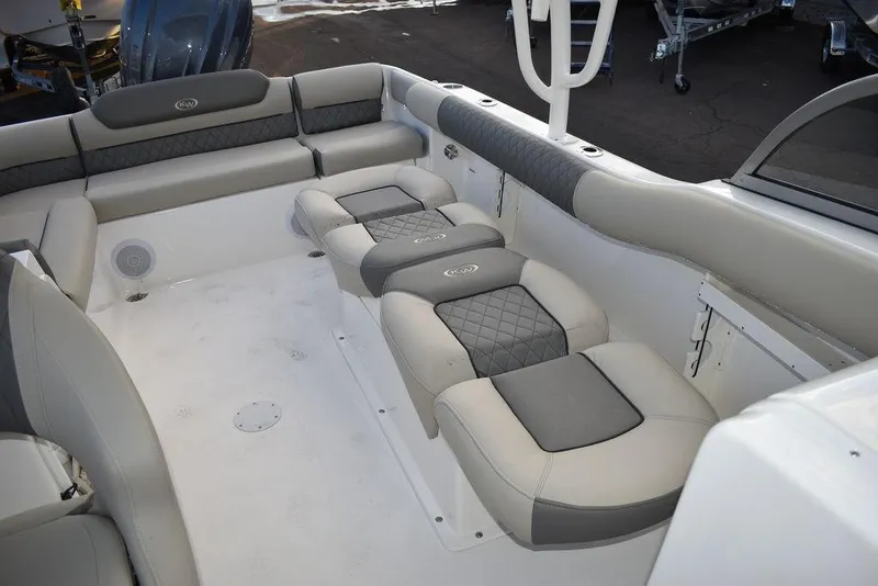 Slide: The Image of 2025 Key West 239 DFS boat interior with cushioned seating and modern design. - 33