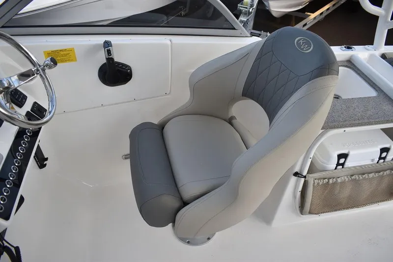Slide: The Image of Captain's seat in 2025 Key West 239 DFS boat, featuring ergonomic design and premium materials. - 34