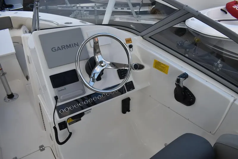 Slide: The Image of 2025 Key West 239 DFS boat dashboard with Garmin navigation system. - 37