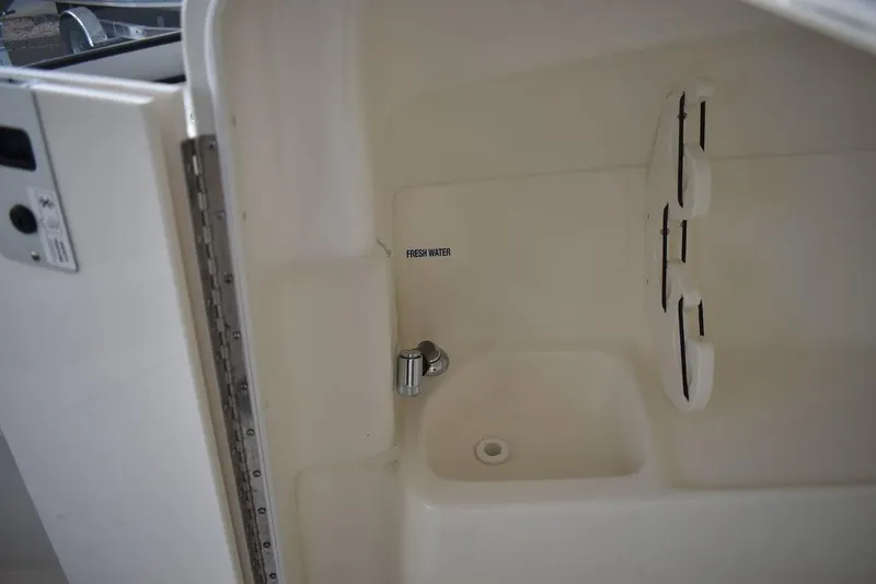 Slide: The Image of Interior of 2025 Key West 239 DFS boat, featuring a fresh water sink. - 46