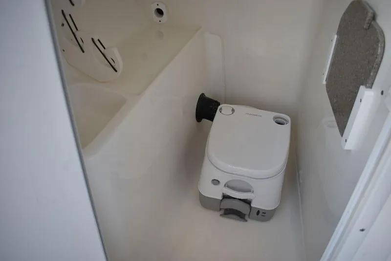 Slide: The Image of Portable toilet in 2025 Key West 239 DFS boat interior. - 47