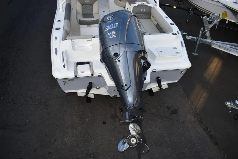Slide: The Image of 2025 Key West 239 DFS boat with powerful 300 V6 engine, rear view. - 7