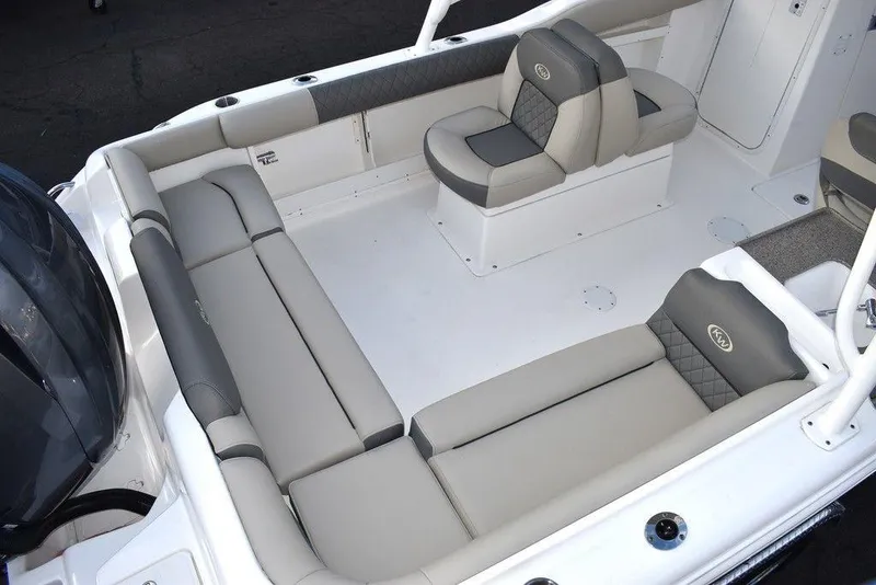 Slide: The Image of 2025 Key West 239 DFS boat interior with cushioned seating and modern design. - 9