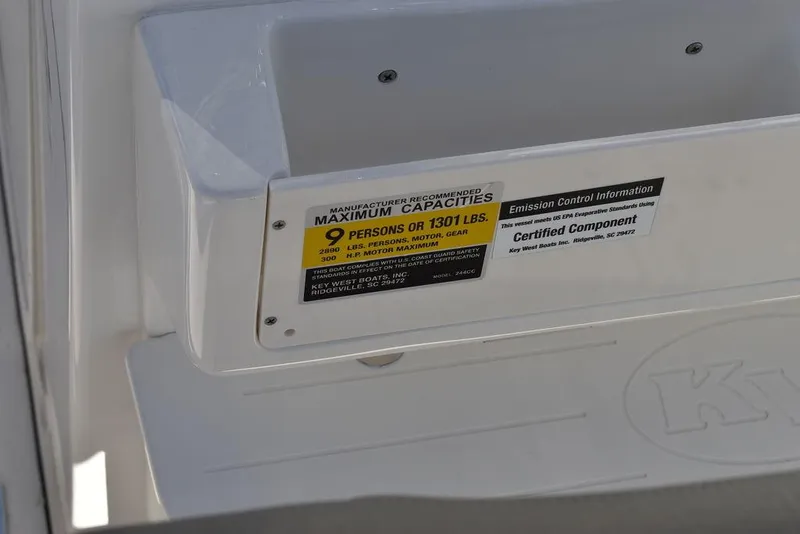 Slide: The Image of Key West 244 CC 2025 boat capacity label, 9 persons or 1301 lbs. - 27