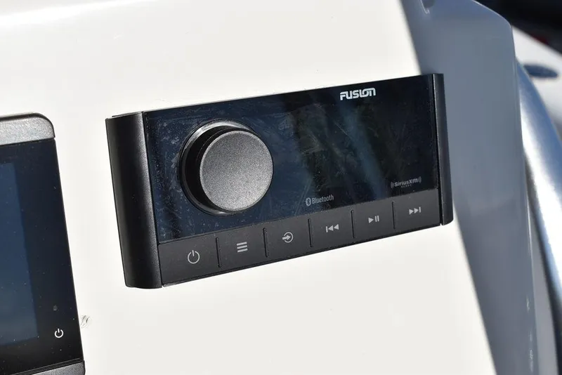 Slide: The Image of Fusion stereo system on 2025 Key West 244 CC boat dashboard. - 33
