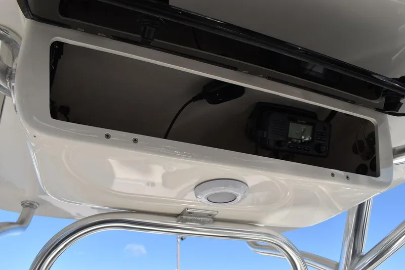 Slide: The Image of 2025 Key West 244 CC boat console storage with electronic equipment. - 36