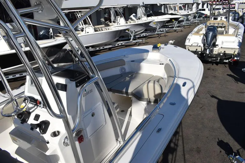 Slide: The Image of 2025 Key West 244 CC boat with sleek design and spacious seating. - 10