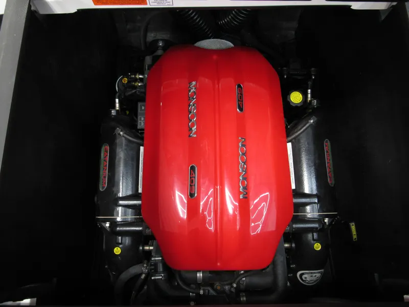 Slide: The Image of 2018 Axis A24 engine with red cover, showcasing powerful performance components. - 10