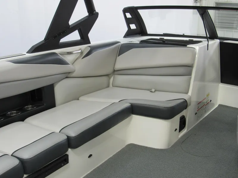 Slide: The Image of 2018 Axis A24 boat interior with gray and white seating. - 5