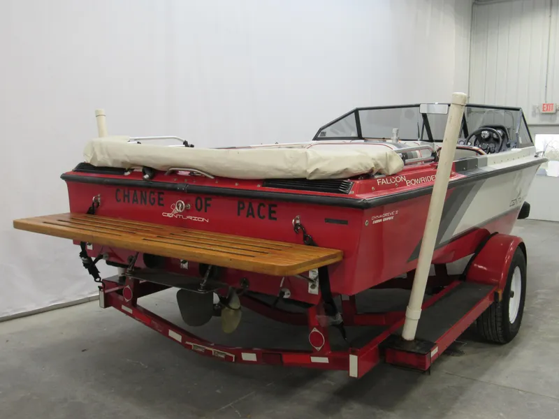 Slide: The Image of 1990 Centurion Falcon BR boat on trailer, red and white, rear view. - 6