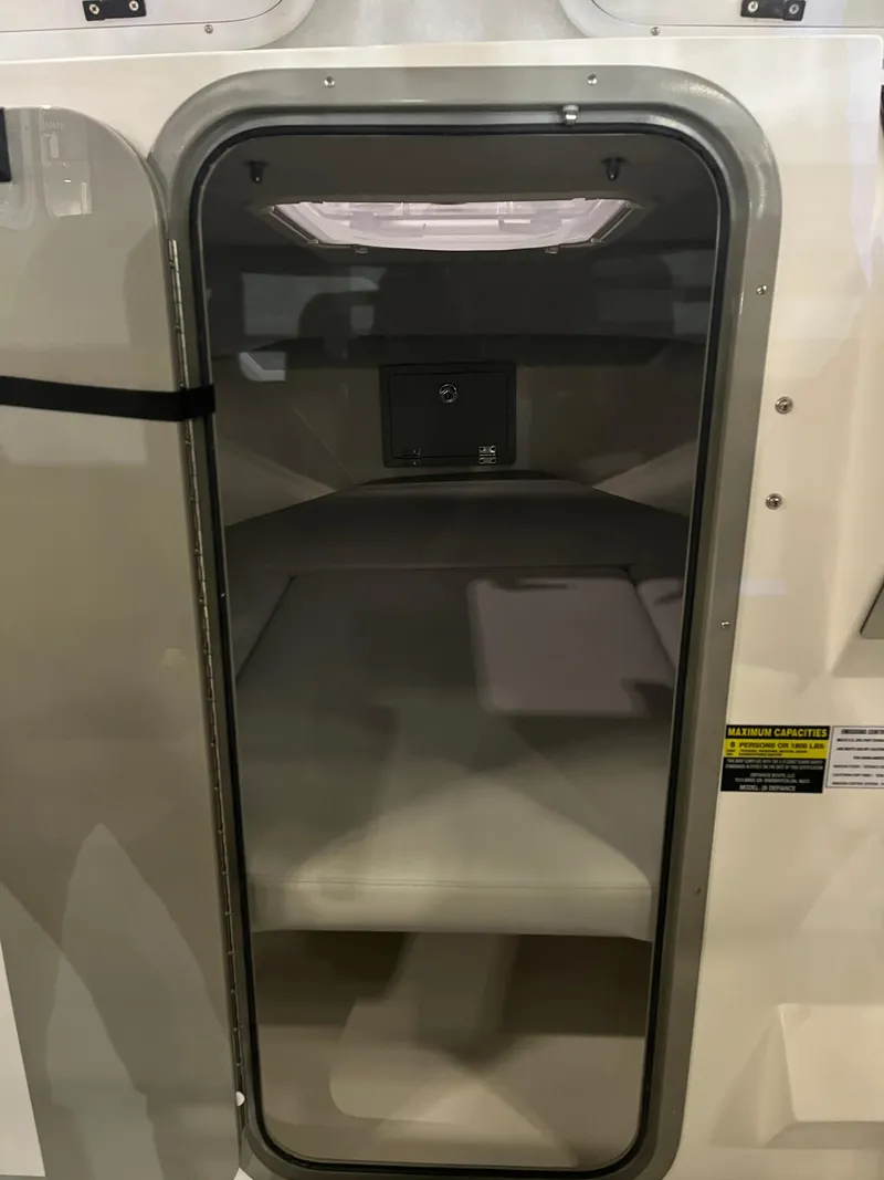 Slide: The Image of Interior cabin view of 2025 Defiance Admiral 260 EX boat. - 11