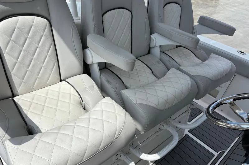 Slide: The Image of Luxurious seating on 2020 Sea Fox Commander 328 boat with quilted upholstery. - 10