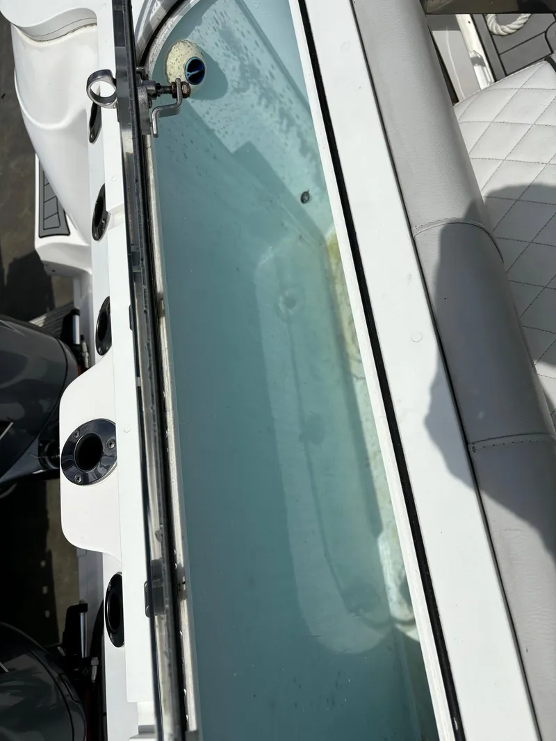 Slide: The Image of Sea Fox Commander 328 livewell with water, 2020 model boat interior. - 14