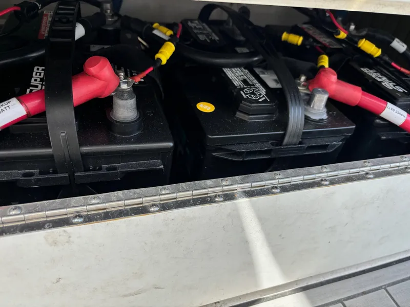 Slide: The Image of Batteries in a 2020 Sea Fox Commander 328 boat, secured with straps and connected with cables. - 18
