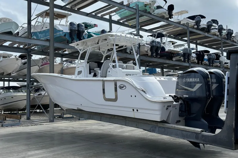 Slide: The Image of 2020 Sea Fox Commander 328 boat with Yamaha engines in storage facility. - 3